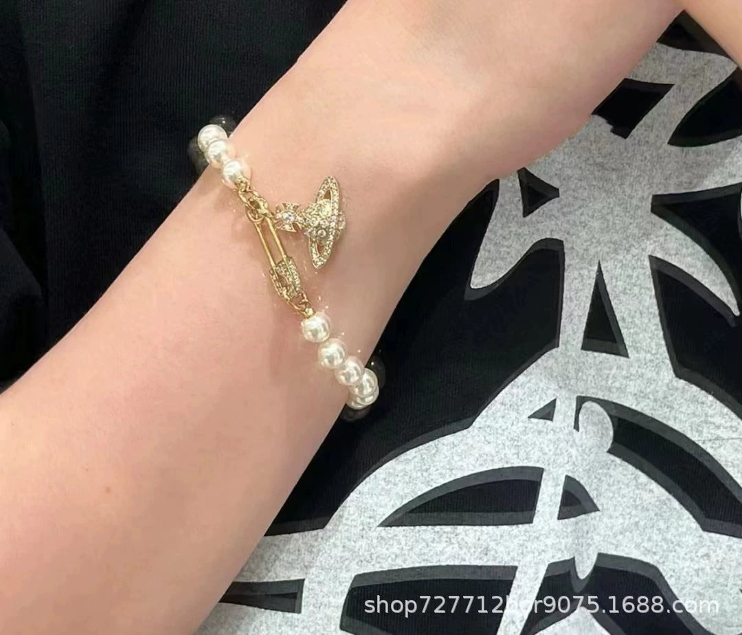 Saturn paperclip pearl bracelet